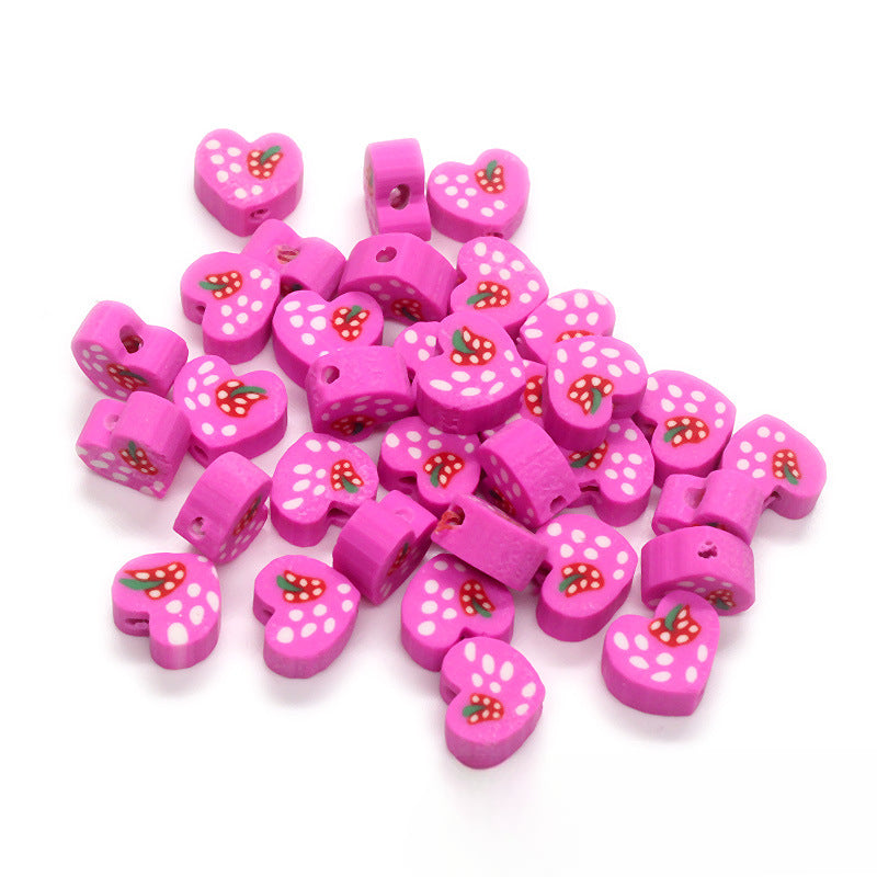 Al por mayor 1000pcs/Pack Corn Ladybug Daisy Aguacada Strawberry Beads suave de cerámica